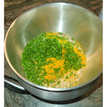 A stainless steel mixing bowl filled with fresh, natural dry ingredients like parsley and turmeric, showcasing the wholesome recipe. Thumbnail
