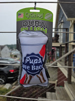 A Cycle Dog Dura Plush dog toy hanging on a wire fence outdoors. The white mesh toy features a faux fur trim, red and blue graphic accents, and a central blue badge that reads 'Pups Love Bae'. Thumbnail