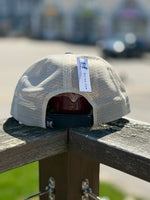 Meshed Back of the Navy and white Boothbay Harbor Dog Treats trucker hat. Thumbnail