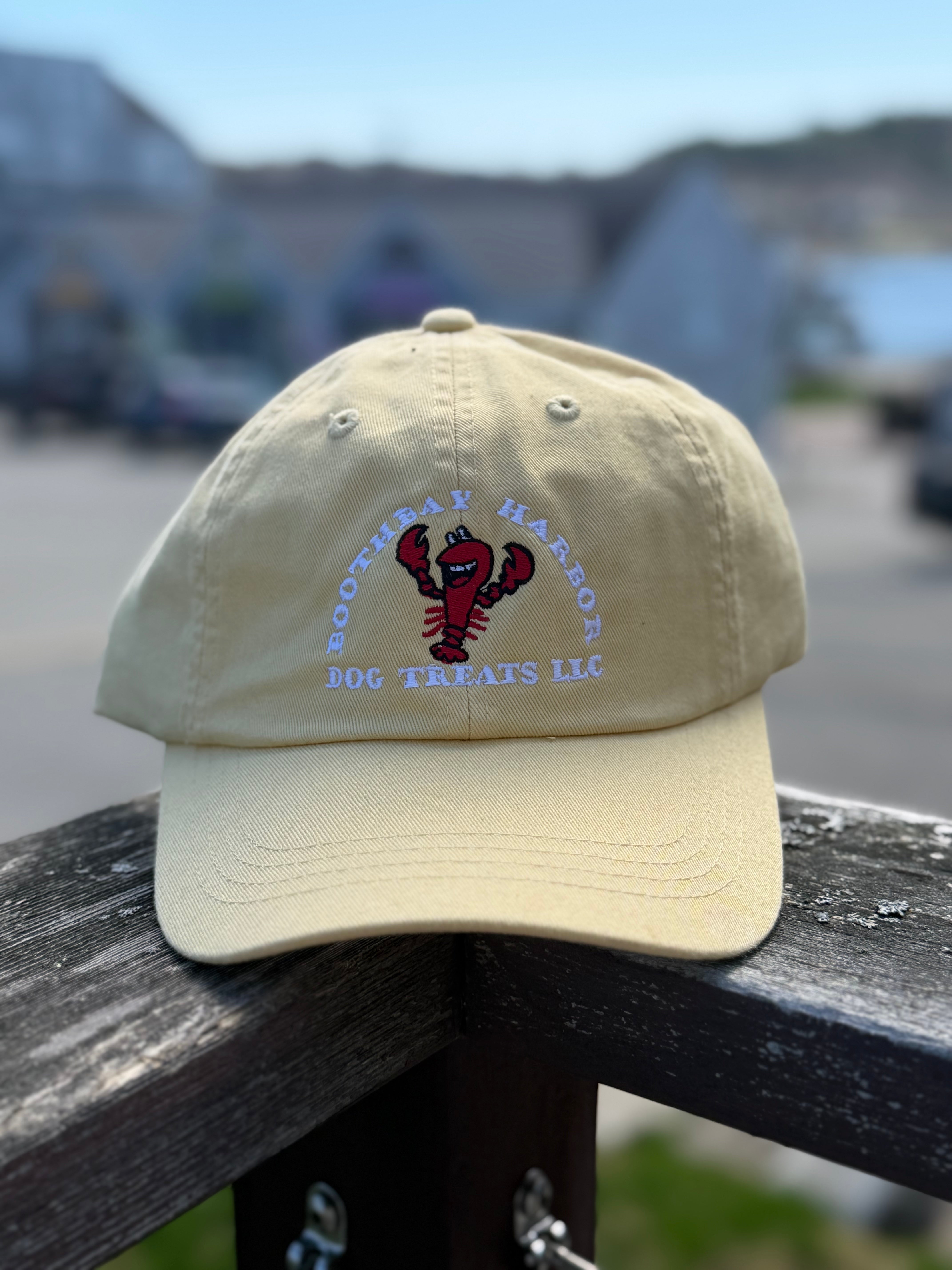 Khaki Boothbay Harbor Dog Treats dad hat with embroidered red lobster logo.