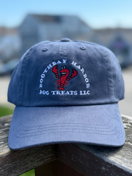 Blue Boothbay Harbor Dog Treats dad hat with embroidered red lobster logo