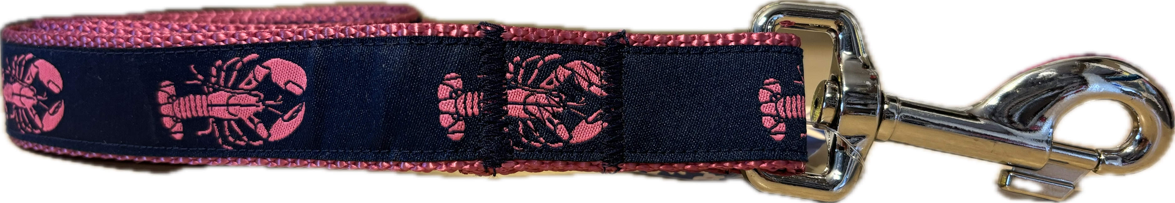 A horizontal view of a dog leash featuring a dark navy blue fabric ribbon with a repeating pink lobster pattern, stitched onto contrasting vibrant pink nylon webbing and attached to a silver metal swivel snap hook.